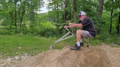 sandbox with digger|senior adult sandbox digger.